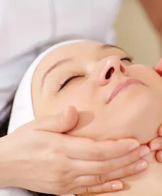 Facial massage at beauty treatment salon